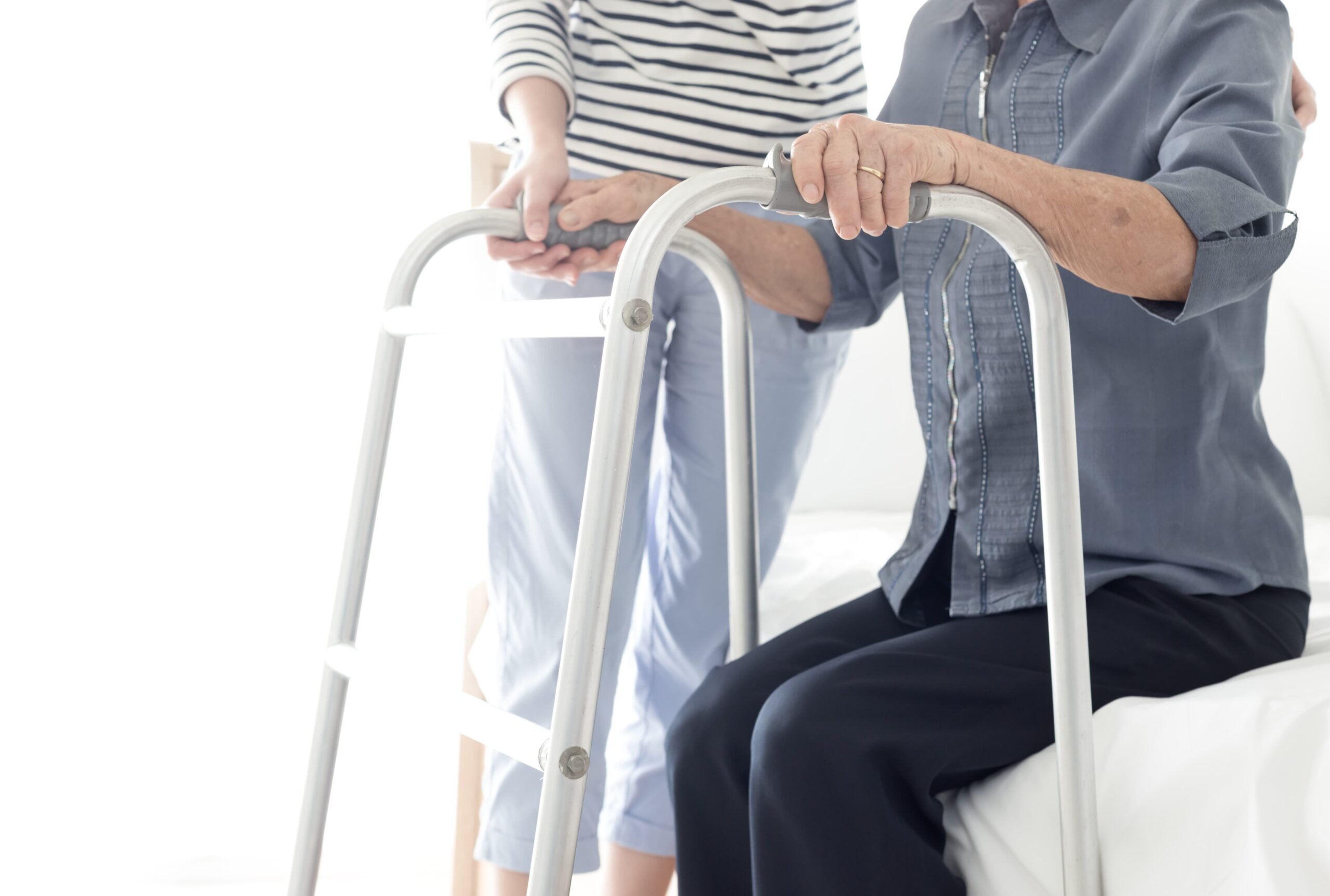Person with long term disability using a walker