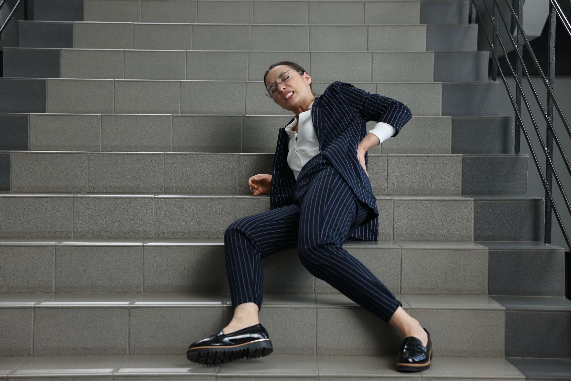 woman falling down a staircase