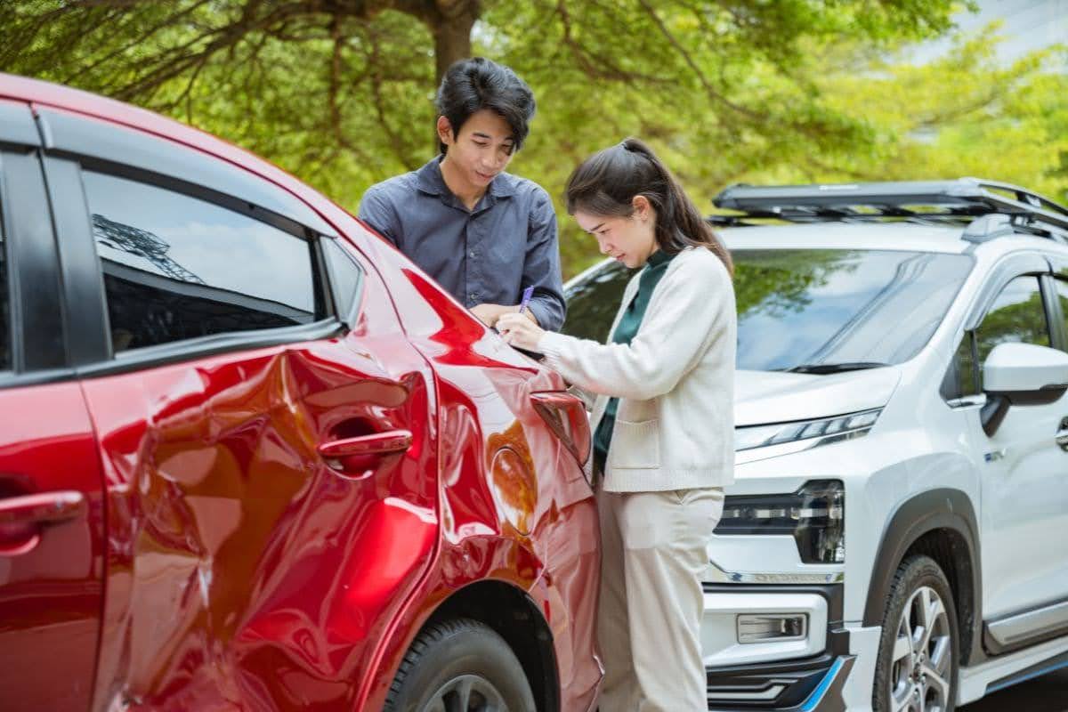 two people changing contact after accident